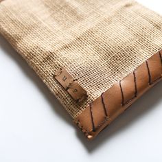 A great little bag for your accessories or use as a small purse/clutch. Made from burlap and suede/leather with a soft cotton lining to protect your valuables. Hand crafted by Mayan artisans who work from home and are paid per bag, helping preserve their family unit. Hand crafted in the Yucatan, Mexico Leather, burlap and cotton 10" L X 6.25" W Family Unit, Yucatan Mexico, Small Purse, Purse Clutch, Work From Home, Leather Clutch, Suede Leather, From Home, Burlap