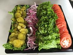 there are many different types of vegetables on the tray