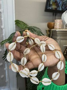 Handmade cowrie hoop earrings made with brass , do you like them big? Well here it is, super fun and not heavy Trendy Gold Hoop Earrings For Vacation, Unique Adjustable Hoop Earrings For The Beach, Handmade Shell-shaped Hoop Earrings For Summer, Handmade Gold Hoop Earrings For Vacation, Gold Hoop Earrings For Vacation, Metal Hoop Earrings For Beach, Handmade Hoop Jewelry For The Beach, Handmade Gold Hoop Earrings For Beach, Gold Metal Hoop Earrings For Beach