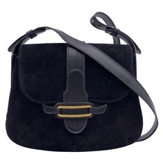 Vintage Gucci shoulder bag in black suede and leather. Flap closure with gold metal application on the front. Black leather lining. 1 side zip pocket and 2 side open pockets inside. Adjustable shoulder strap. 'Made in Italy by GUCCI' embossed inside Condition B - VERY GOOD Minimal wear of use on suede. Please check the photos carefully and ask if you need to know more details or if you have any doubts. Details MATERIAL: Suede COLOR: Black MODEL: n.a. GENDER: Women COUNTRY OF MANUFACTURE: Italy S Luxury Saddle Bag With Leather Trim For Formal Occasions, Luxury Formal Saddle Bag With Leather Trim, Designer Suede Shoulder Bag With Gold-tone Hardware, Luxury Suede Bags With Gold-tone Hardware, Formal Suede Bags With Suede Lining, Classic Suede Bags For Formal Occasions, Luxury Suede Shoulder Bag For Formal Occasions, Elegant Saddle Bag With Leather Trim, Formal Saddle Bag With Leather Trim