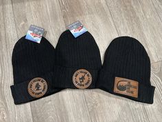 Keep you head warm with these black beanies!  Attached on each beanie is your choice of leather patch. Black Beanie With Fleece Lining, Black Hat With Leather Patch, One Size Fits Most, Black Hat With Leather Patch One Size, Black Hat With Leather Patch, Black Hats With Leather Patch, Black Casual Beanie For Outdoor Activities, Casual Black Beanie With Fleece Lining, Black Fleece-lined Hats For Winter Sports, Black Beanie For Outdoor Activities