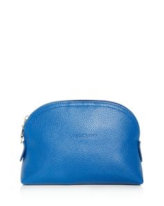 Longchamp's petite, purse-friendly cosmetic case is luxuriant in lightly textured leather. Elegant Leather Round Case Bag, Elegant Compact Leather Bag, Formal Leather Pouch Cosmetic Bag, Leather Cosmetic Bag With Removable Pouch For Evening, Evening Leather Cosmetic Bag With Removable Pouch, Elegant Compact Leather Coin Purse, Leather Evening Cosmetic Bag With Removable Pouch, Elegant Leather Cosmetic Bag For Business, Elegant Leather Pouch Cosmetic Bag