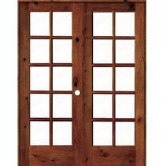 a wooden door with two glass panels