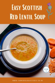 a bowl of red lentil soup with carrots and parsley on the side