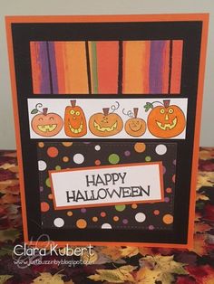 a happy halloween card with pumpkins on it