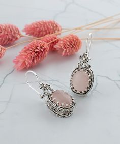 Rose Quartz Boho Silver Drop Earrings, 925 Sterling Pink Gemstone Artisan Handcrafted Filigree Ornate Jewelry, Handcrafted Earrings,Handmade Earrings, Birthday gift, Anniversary gift Material: 925 Sterling Silver ( NICKEL FREE ) Length and Width: 3.6cm X 1.3cm // 1.4 Inches X 0.5 Inches Gemstone: Rose Quartz 10x14 mm. These blue stone earrings add a bold fashion statement to any look. The handcrafted designs that make a beautiful fashion statement in that cocktail earrings. This vintage, origina Pink Bohemian Sterling Silver Earrings, Bohemian Pink Sterling Silver Earrings, Pink Earrings With Intricate Design For Gift, Blue Stone Earrings, Ornate Jewelry, Cocktail Earrings, Stylish Earring, Pink Gemstones, Hand Crafted Gifts