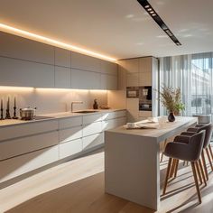 the kitchen is clean and ready to be used for dinner or lunchtime, with modern appliances