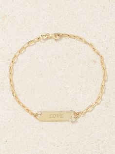 Inspired by traditional ID bracelets, STONE AND STRAND’s version is engraved with the word ‘Love’. Its handmade from 10-karat gold and punctuated with two clusters of glittering diamonds. It’s a meaningful gift for an anniversary or milestone. Sterling Silver Bracelets For Promise, Sterling Silver Yellow Gold Bracelets For Promise, Yellow Gold Sterling Silver Bracelets For Promise, Yellow Gold Nameplate Bracelet With Engraving Option, 14k Gold Name Bracelet With Engraving Option, 14k Gold Nameplate Bracelet For Anniversary, Engravable Nameplate Bracelet In Yellow Gold, 14k Yellow Gold Chain Bracelet For Anniversary, Dainty 14k Yellow Gold Name Bracelet