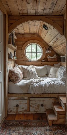 a bed in a room with wooden walls