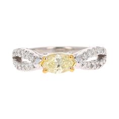 a yellow and white diamond ring