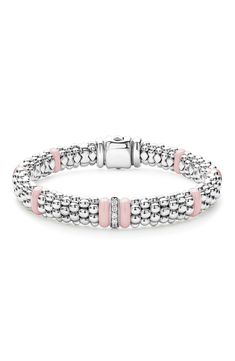 A single band of diamonds enchants this polished bracelet crafted with sterling silver Caviar beading and pink ceramic stations. Exclusive retailer Total diamond weight: 0.01ct. Color: G–H Clarity: I Sterling silver/ceramic/diamond Imported Elegant Pink Stackable Bracelets, Luxury Pink Diamond Bracelet With Accents, Luxury Pink Beaded Bracelets, Station Bracelet, Pink Ceramic, Bracelet Crafts, Pink Bracelet, G H, Beading