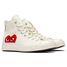 The iconic collaboration between Converse and Comme Des Garçons PLAY continues with the All Star Chuck ‘70 Hi. The traditional Converse silhouette features the signature bug-eyed red heart motif throughout the exterior. The silhouette is complete with a full-lace closure, and a rubber toebox and outsole for extended durability. CHUCK TAYLORS RUN ABOUT 1/2 SIZE LARGE, WE RECOMMEND SIZING DOWN. THIS PRODUCT DOES NOT QUALIFY FOR ANY DISCOUNTS OR SPECIAL PROMOTIONS. Canvas upper Printed CDG heart lo Heart Converse, Comme Des Garcons Shoes, Converse X Comme Des Garcons, Converse Play, Doodles Ideas, Obx Dr, Cute Converse, Comme Des Garcons Converse, Dr Shoes