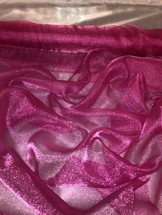 Hi there..Thank you for looking at my item Bellow you will find out all the information You need to know about this beautiful elegant fabric This is sold by the meter Really good quality Organza fabric This fabric is used for... *Bridal dresses *Decorations *Veil *Under skirts *Dance costumes And for many other project When you make the purchase, If more than one quantity is bought, It will be sent in one continuous length Items will be dispatched once payments are cleared All my items are posted with royal mail first class (1-2 working days) I also combine postage if more than one quantity is purchased (PLEASE NOTE) I try my best to get the exact colour Of the fabric,there might be a slight difference in colour due to the screens and camera lighting If you require SPECIAL DELIVERY SERVICE Tutu Decorations, Pink Wedding Theme, Butterfly Bags, Bridal Table, Elegant Fabric, Pink Sparkly, Red Butterfly, Bridal Fabric, Net Fabric