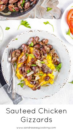 a white plate topped with food next to a bowl filled with meat and veggies