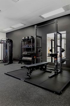 Gym studio with bright neon lights, black floors and gym equipment. Private Garage Luxury, Private Home Gym, Home Gym Smith Machine, Luxury Home Gym Ideas, Garage Gym Black Walls, Private Gym Design, At Home Gym Ideas Garage, Home Weight Room, Best Gym Design