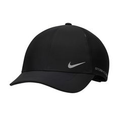 the nike cap is black and has a white swooish on the front side