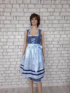 blue Gingham Dirndl Dress Oktoberfest Clothing trachten floral Dirndl  bavarian dress German Dress Festival Dress Folk Dress oktoberfest dress M 2P height of the woman in the photo - 180 cm Please refer to photos for details of condition.  Condition: very good vintage Measurements TAG SIZE 38: Length: 110 cm/ 43.3" Bust: 94 cm/ 37" Waist: 75 cm/ 29.5" Hips: free note The color on the pictures may vary due to monitor settings and light reflections. Ready to ship Please do not hesitate to contact with me for any questions. Thank you for shopping today! Blue Fitted Dress For Oktoberfest, Fitted Blue Dress For Oktoberfest, Oktoberfest Clothing, Dirndl Dress Oktoberfest, Bavarian Dress, Oktoberfest Dress, German Dress, Oktoberfest Outfit, Folk Dress