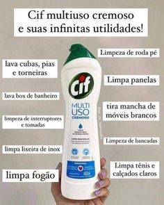 a woman holding up a bottle of mouthwash in her hand with spanish words below it