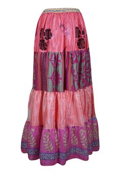 Elevate your wardrobe with the vibrant charm of this flared maxi skirt, skillfully made from upcycled saree fabric. Adorned with rich Rouge Pink and floral patterns alongside bold, eye-catching prints, each silk blends skirt is a unique masterpiece. The adjustable drawstring waist and flowing ankle-length silhouette provide a flattering and comfortable fit, effortlessly combining boho-chic style with everyday practicality. Whether you're wandering through a farmer's market or dancing at a beach Luxury Multicolor Tiered Skirt, Cheap Pink Bohemian Maxi Skirt, Luxury Pink Tiered Maxi Skirt, Luxury Bohemian Multicolor Maxi Skirt, Luxury Pink Bohemian Skirt, Cheap Bohemian Pink Maxi Skirt, Beach Long Skirt, Skirt Patchwork, Flare Maxi Skirt