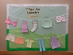 a bulletin board with clothes hanging from it's sides and the words tips for laundry enquisit written on them