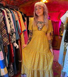 "This is a classic 70's bohemian dream dress in a mustard yellow with floral design. It is full length with an empire waist that ties in the back to cinch to your shape. It zips closed in the back. This is technically a juniors dress so very small in the bust. Note below for sizing.  Length 57\" Bust 28\" Waist 20-24\" Hips 38\"" Yellow Dress Outfit, Mustard Yellow Dress, 70s Fashion Dresses, Mustard Yellow Dresses, Boho Style Dresses, Prairie Dress, Hippie Dresses, Junior Dresses, 70s Fashion