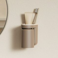 Wall-Mounted Mouthwash Cup Set  Bathroom Toothbrush Holder with Shelving,Space-Saving Design Features: Convenience: The toothbrush holder is designed to fit on the wall without drilling and is easy to install. It's a great space-saving solution for bathrooms of any size. Durability: Made from plastic materials, this toothbrush holder is built to last. The sturdy design ensures that they stay in place. Hygiene: The holder's design ensures that toothbrushes are kept off of the counter. The holder Bathroom Toothbrush Organization, Shelving Bathroom, Organize Bathroom Countertop, Marble Bathroom Accessories, Toothbrush Organization, Wall Mounted Toothbrush Holder, Alternative Disney, Electric Toothbrush Holder, Toothbrush Holder Wall