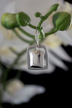 "* Beautiful drop earrings in sterling silver with a square frame * The drop is 1 1/4\" long from the top of the ear wire. * The width is 5/8\". * The weight is 6 grams of solid .925 sterling. * Highly reflective. high polish * Quality look and feel. Makes a great gift for loved ones." Earrings Square, Sterling Silver Drop Earrings, Silver Dangle Earrings, Sterling Silver Dangle Earrings, Silver Drop Earrings, Square Frame, Silver Earrings Dangle, Square Frames, Ear Wire