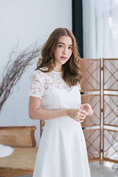 "*DHL shipping upgrade is available at check out process. Shipping part by DHL will take 3-6 days only. Production time may take around 2-3 weeks. If this is in rush you can convo us to make it sooner.:) A white lace dress which can be worn in formal wedding party. The dress featured two pieces of lace see through top and inner straps white dress. The lace top can be worn both nicely on the outside or the inside of the dress. Polite modest design but highly elegant look for your special day. Als Short Sleeve Gown With Lace Bodice For Wedding, Wedding Dress With Lace Top And Fitted Bodice, Elegant Lace Top Dress For Wedding Night, Lace Back Dress For Ceremony, White Lace Bodice Dress For Bride, Lace Wedding Gown With Short Sleeves, White Lace Bodice Bridal Dress, White Bridal Dress With Lace Bodice, Elegant Lace Bridal Dress