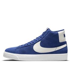 The Nike Zoom Blazer Mid SB 'Deep Royal Blue' is a stylish and modern sneaker that is perfect for any occasion. It features a blue velvet upper with a white leather Swoosh and heel counter, as well as a mesh lining. The rubber sole is finished with a white midsole for a sleek look. This sneaker is inspired by the classic Blazer series, and is perfect for everyday wear, as well as sports activities. With its timeless silhouette and modern design, the Nike Zoom Blazer Mid SB 'Deep Royal Blue' is a must-have for any sneaker enthusiast. (SNKR/Skate/Casual/Mid Top) Nike Sporty Suede High-top Sneakers, Nike Suede Sneakers With White Sole, Classic Blue High-top Sneakers With Contrast Sole, Blue Suede Sneakers For Streetwear, Classic Blue Leather High-top Sneakers, Blue Classic High-top Sneakers For Sports, Classic Blue High-top Sneakers For Sports, Blue Leather Mid-top Skate Shoes, Blue Suede Low-top Skate Shoes