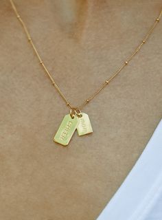 Designed especially for the devoted Cheer Mom, wear this necklace as a symbol of your love for cheer and your favorite cheerleader. 14k gold plated, reversible CHEER charm tag along with reversible "mom" mini tag on an 18" chain. Product details - 14k gold plated, reversible mini mom tag (.35 x .5") with heart on-the-flip. - 14k gold plated, reversible cheer tag 14k (.75" x .5") with heart on-the-flip.- 14k gold-filled, 18" chain with spring-ring closure & brand logo at clasp. - Ready to gift on Cheer Jewelry, Golf Necklace, Golf Jewelry, Rose Gold Crystal, Gifts For Golfers, Bag Icon, Cheer Mom, Team Gifts, Crystal Collection