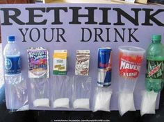 a sign that says, rethink your drink on the side of a table