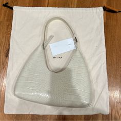 Condition: Like New! Just Used Once And With Dust Bag Croc-Embossed Leather Shoulder Bag In Off-White. Fixed Shoulder Strap Zip Closure Patch Pocket At Interior Cotton Twill Lining In Beige Logo-Engraved Silver-Tone Hardware H6 X W14.5 X D1.5 In Supplier Color: Cream Leather. Made In Bulgaria. 221289f048071 Silver Engraving, Patch Pocket, Embossed Leather, Cotton Twill, Leather Shoulder Bag, Dust Bag, Shoulder Strap, Off White, Bag Lady