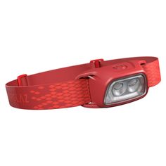 a red headlamp is shown on top of a white background with the light turned on