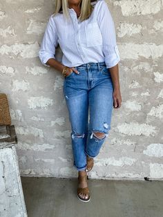 Our new 'Sunfaded Midrise Boyfriend' jeans are designed with a relaxed leg and cuff for the effortless modern look. They feature a mid rise fit, distressing on the thigh, knees, and back pockets and frayed bottom hem for a trendy look - and the light wash is perfect for any spring and summer outfit! Kancan brand denim True to size Rise 9.5", Inseam 27" in size 5/26 99% Cotton, 1% Spandex Machine wash cold and tumble dry low Ripped Light Wash Cropped Jeans For Fall, Trendy Distressed Cropped Jeans For Everyday, Distressed Mid-rise Cropped Jeans For Everyday, Trendy Washed Cropped Jeans For Everyday, Everyday Distressed Cropped Jeans For Spring, Mid-rise Washed Blue Distressed Cropped Jeans, Everyday Washed Blue Distressed Jeans, Everyday Distressed Washed Blue Jeans, Ripped Cotton Relaxed Fit Cropped Jeans