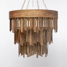 a wooden chandelier hanging from a chain