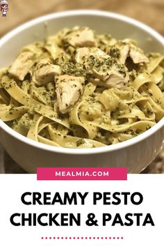 creamy pesto chicken and pasta in a white bowl on a wooden table with text overlay