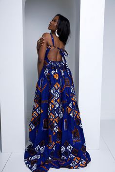 Bohemian Long Dress For Festivals, Bohemian Long Skirt Dress For Festivals, Printed Floor-length Maxi Dress For Festivals, Blue Bohemian Long Dress, Bohemian Floor-length Maxi Dress With Tie Back, Blue Backless Maxi Dress With Tie Back, Blue Maxi Backless Dress With Tie Back, Traditional Multicolor Sleeveless Maxi Dress, Floor-length Printed Dress For Wedding