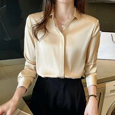 This Is A Beautiful Satin Finished Champagne Colored Blouse Very Classy And Elegant! 97%Polyester 3%Spandex! Size Med.This Blouse Is Flawless Not A Mark Or Snag! Button Down Closure Long Sleeve With Button Closure. Blouse Is Sure To Be A Head-Turner!! Measurements: Underarm To Underarm: 20” Front: 27” Back: 29” Sleeve: 23” Formal Tops For Women, Office Shirts, Women Blouses Fashion, Womens Trendy Tops, Satin Shirt, Turndown Collar, Satin Blouse, Vintage Button, Office Lady