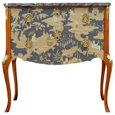 an ornately decorated blue and gold chest