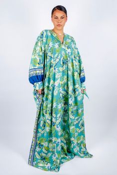 Material: Polyester Pattern Type: Floral Color: Multicolor Fabric: Fabric has no stretch Care Instructions: Machine Wash and Air Dry/Dry Clean Green Floral Print Long Sleeve Kaftan, Green Floral Print Maxi Kaftan, Multicolor Long Sleeve Kaftan For Daywear, Blue Floral Print Long Sleeve Kaftan, Blue Long Sleeve Kaftan With Floral Print, Green Floral Print Tunic Maxi Dress, Green Floral Tunic Maxi Dress, Green Kaftan For Daywear In Spring, Green Long Sleeve Tropical Print Dress