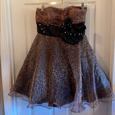 Blush Prom Gown. Nwt. Animal Print. Five Layers. Black Sequenced Bow Detail. Can’t Be Worn Strapless Or Spaghetti Straps Are Attached. Armpit To Armpit 15 Inches. 27 Inches Long. Stunning Gown. Size 10. Wired Bust For Better Fit. Km 2000s Quinceanera Dresses, Bratz Fashion Inspiration, Long Green Dress Formal, Blush Prom Dresses, Thrift Inspiration, Halter Party Dress, Blush Prom Dress, Party Gown Dress, Green Formal Dresses