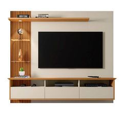 a flat screen tv mounted to the side of a wall next to a wooden shelf