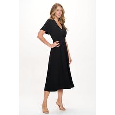 Our Candace dress has a v-neckline, flutter sleeves, a faux wrap detail and a straight hem. The easy fit silhouette and comfort stretch will make this dress a favorite piece you'll want in every print and color. Made in USA. Machine washable Chic Flowy V-neck Wrap Dress, Flowy V-neck Dress With Surplice Neckline For Date Night, Flattering V-neck Wrap Dress For Summer, Chic Black V-neck Dress With Surplice Neckline, Black V-neck Dress With Surplice Neckline For Spring, Flowy V-neck Midi Dress For Work, Black Wrap Dress For Night Out, Black Wrap Dress For Date Night, Flowy Midi Dress With Surplice Neckline