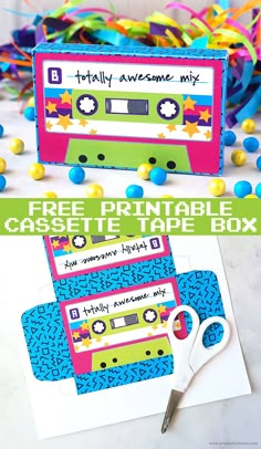 the printable cassette tape box is next to scissors and confetti