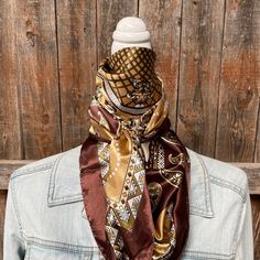 Our classic wild rag/scarf in earth tones with a paisley pattern. It is a square and measures 35" x 35". It is sure to add a bright pop of color to any outfit. Western or Crystal slides available to accent 100% machine washable polyester, silky and soft. Vintage Brown Scarf With Paisley Print, Brown Bohemian Bandana Print Scarves, Bohemian Brown Bandana Print Scarves, Bohemian Brown Scarves With Bandana Print, Bohemian Brown Silk Scarf For Fall, Outfit Western, Bright Pop, Wild Rag, Burnt Orange Color