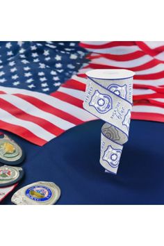 Show some support with this 2.5" Police Badge Ribbon: Grey (10 Yards)! This ribbon includes a sewn wired edge, along with a collection of supportive words and badges throughout, making this ribbon an excellent display of appreciation! Use this ribbon in a wreath display, paired with a matching sign, to make a heartfelt tribute. RGC13435X Supportive Words, Wreath Display, Hometown Heroes, Police Badge, Burlap Ribbon, Gray Background, Burlap, Wreath, Ribbon