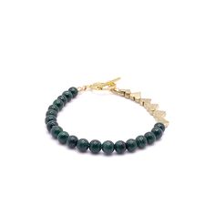 Elegant deep green 4mm malachite beads are finished with 6 gold plated metal hearts. Feel the luxurious weight of the bracelet and enjoy the vibrant beauty of malachite. Length 7" Secures with a gold plated brass toggle clasp. Handmade in Lincoln, Nebraska Green Malachite Beaded Bracelets, Green Heart Beads Bracelet Jewelry, Elegant Malachite Round Beads Bracelets, Green Heart Beads Bracelet, Hand-strung Gold Malachite Jewelry, Gold Malachite Jewelry Hand-strung, Gold Malachite Bracelet, Metal Hearts, Bracelet Elegant