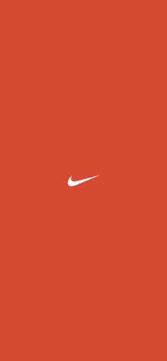 a red wall with a white nike logo on the left and an orange back ground