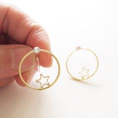 🌿 Made with 2cm diameter 14k gold plated Star Circle with Swarovski Crystals! 👉🏻 You can choose your earrings closure * Invisible Clip On (for non-pierced ears) or 14k Gold Plated Post (for pierced ears)! ✏️ It's around 2cm in diameter. ✌🏻Sold as a PAIR 💖 It is the most comfortable clip on earrings, it had been tested on myself, my daughter and my friend! They are secure and comfortable! If you have non-pierced ears like us, you will fall in love with this and make yourself look great every Everyday Gold Star-shaped Hoop Earrings, Star-shaped Gold Plated Hoop Earrings In Yellow Gold, Dainty Round Earrings With Star Charm, Gold Round Earrings With Star Charm, Round Star Charm Earrings For Gift, Round Earrings With Star Charm For Gift, Round Star Charm Earrings, Gift Earrings With Round Star Charm, Gift Round Earrings With Star Charm