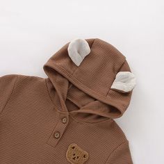 Made from Organic Cotton: An eco-friendly, breathable, and hypoallergenic fabric that’s gentle on delicate skin. Care Instructions: Machine wash on a gentle cycle, tumble dry on low. A Thoughtful Gift: Ideal for birthdays, holidays, or any day you want to make extra special for the little one in your life. Bear Ear Hoodie, Teddy Bear Ears, Spring Baby Clothes, Romper Casual, Bear Outfits, Bear Ears, Casual Rompers, Baby Colors, Spring Baby